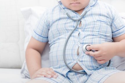 Obese Fat Boy Check Stomach By Stethoscope